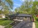 Aerial shot of a home showcasing landscaping, new driveway, and great curb appeal at 165 N 9Th St, Zionsville, IN 46077