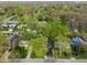 Aerial neighborhood view with lush greenery, mature trees, and a mix of homes at 165 N 9Th St, Zionsville, IN 46077