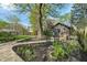 Backyard with a garden path and a guest house at 165 N 9Th St, Zionsville, IN 46077