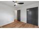 Bedroom featuring a closet, light wood floors, and access to another room at 165 N 9Th St, Zionsville, IN 46077