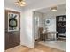 Inviting entryway with light floors, natural light and a view to the home office at 165 N 9Th St, Zionsville, IN 46077