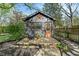 Charming guest house with a wooden deck and a decorative star at 165 N 9Th St, Zionsville, IN 46077