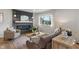 Comfortable living room with stylish furniture, a modern fireplace, and natural light at 165 N 9Th St, Zionsville, IN 46077