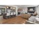 Open living space showcases a kitchen, dining area, and a modern living room at 165 N 9Th St, Zionsville, IN 46077