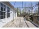 Spacious back deck offers plenty of room for outdoor relaxation, featuring a decorative pergola at 1809 Ernest Ct, Indianapolis, IN 46234