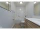 Bright bathroom featuring a shower-tub combo, vanity with sink, and modern fixtures at 1809 Ernest Ct, Indianapolis, IN 46234