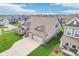 Aerial view of beautiful home with a well-manicured lawn and attached garages at 1973 Mobley Dr, Westfield, IN 46074