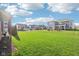 Expansive backyard with lush green grass and beautiful landscaping, great for recreation at 1973 Mobley Dr, Westfield, IN 46074
