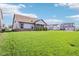 Spacious backyard with well-maintained lawn and views of surrounding houses at 1973 Mobley Dr, Westfield, IN 46074