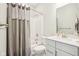 Clean and modern bathroom with a shower-tub combination, vanity, and neutral color scheme at 1973 Mobley Dr, Westfield, IN 46074