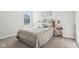 Cozy bedroom with a comfortable bed, side table, and a serene atmosphere at 1973 Mobley Dr, Westfield, IN 46074