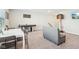 Spacious bonus room features air hockey, basketball hoop, and modern decor at 1973 Mobley Dr, Westfield, IN 46074