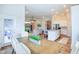 Open-concept dining and living area with lots of light and modern appliances at 1973 Mobley Dr, Westfield, IN 46074