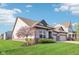 Charming one-story home with a well-manicured lawn, attached two-car garage, and neutral color scheme at 1973 Mobley Dr, Westfield, IN 46074