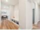 Welcoming hallway with built-in storage, bench and wood-look floors at 1973 Mobley Dr, Westfield, IN 46074