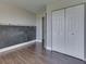 An adaptable bedroom space with neutral walls and a chalkboard wall at 212 Westridge Blvd, Greenwood, IN 46142