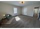 Bedroom featuring plush carpet, a comfortable armchair, and bright natural light at 2135 Union St, Columbus, IN 47201