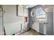 Basement featuring essential utilities and storage solutions for practical home management at 2219 N Webster Ave, Indianapolis, IN 46219