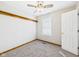 Bright bedroom features fresh paint, carpet, built-in shelving and ample natural light at 225 E 36Th St, Anderson, IN 46013