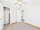 Bright bedroom boasts fresh paint, carpet, and a closet perfect for storage at 225 E 36Th St, Anderson, IN 46013