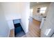 View of the kitchen through the basement stairs, offering a bright modern aesthetic at 241 S Rural St, Indianapolis, IN 46201