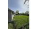 Spacious backyard with a chain link fence offering ample space for outdoor activities and relaxation at 2448 Winfield Ave, Indianapolis, IN 46222