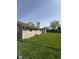View of the home's exterior with a spacious lawn, providing plenty of room for outdoor activities at 2448 Winfield Ave, Indianapolis, IN 46222