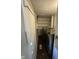 Laundry room with side-by-side washer and dryer and plenty of shelf space at 2448 Winfield Ave, Indianapolis, IN 46222