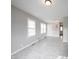 An open-concept living room with abundant natural light and spacious design at 270 S Lasalle St, Indianapolis, IN 46201