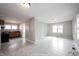 Inviting living space adjacent to kitchen, offering an open floor plan great for entertaining at 270 S Lasalle St, Indianapolis, IN 46201