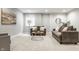 Finished basement featuring sitting area, carpet flooring, natural light, and modern decor at 2785 W High Grove Cir, Zionsville, IN 46077