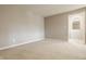 Spacious, empty bedroom with neutral walls and soft carpeting, ready for personalization and comfortable living at 2785 W High Grove Cir, Zionsville, IN 46077