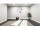 Bright gym space featuring yoga mats, a fitness ball, and a sleek design, ideal for staying active at home at 2785 W High Grove Cir, Zionsville, IN 46077
