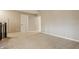 Bright hallway with neutral-toned walls, carpet flooring, and an open layout, ideal for a welcoming transition between rooms at 2785 W High Grove Cir, Zionsville, IN 46077