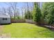 Spacious backyard featuring a lush lawn and a privacy fence, perfect for outdoor activities and relaxation at 3134 Orchard Ave, Indianapolis, IN 46218