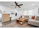 Bright living room boasts a comfortable sectional sofa, large rug, and modern decor at 3134 Orchard Ave, Indianapolis, IN 46218