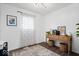 Bright office featuring a desk, chair, and natural light from a large window at 3134 Orchard Ave, Indianapolis, IN 46218