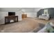 Finished attic space featuring a TV console, comfortable seating, and a cozy bed at 3221 Washington St, Columbus, IN 47203