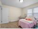 Bedroom with a desk and a window offering plenty of natural light at 3221 Washington St, Columbus, IN 47203