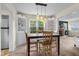Bright dining room featuring custom built-ins, a stylish pendant light, and ample natural light at 3221 Washington St, Columbus, IN 47203