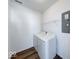 Practical laundry room featuring a washer, dryer, and plenty of storage space at 326 N Warman Ave, Indianapolis, IN 46222