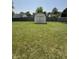 Spacious, flat backyard with a wooden shed and a fully fenced perimeter at 326 Virginia St, Fortville, IN 46040