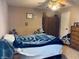 Bedroom with a bed and wooden dresser and night stand at 326 Virginia St, Fortville, IN 46040