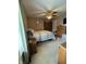 Neutral bedroom features carpeted floors, ceiling fan and a warm, inviting atmosphere at 326 Virginia St, Fortville, IN 46040