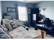 Bedroom with a bed, desk, and window at 326 Virginia St, Fortville, IN 46040