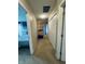 Carpeted hallway connecting bedrooms with large closet and central AC unit at 326 Virginia St, Fortville, IN 46040