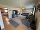 Cozy living room featuring plush seating, modern TV set, and warm, neutral colors at 326 Virginia St, Fortville, IN 46040