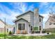 Back of home featuring a patio with seating, a well-kept lawn, and neutral siding at 3466 Firethorn Dr, Whitestown, IN 46075
