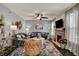 Cozy living room with fireplace, TV, and comfortable seating arrangement at 3466 Firethorn Dr, Whitestown, IN 46075