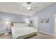 Inviting main bedroom with ceiling fan, neutral tones, and cozy furnishings at 3466 Firethorn Dr, Whitestown, IN 46075